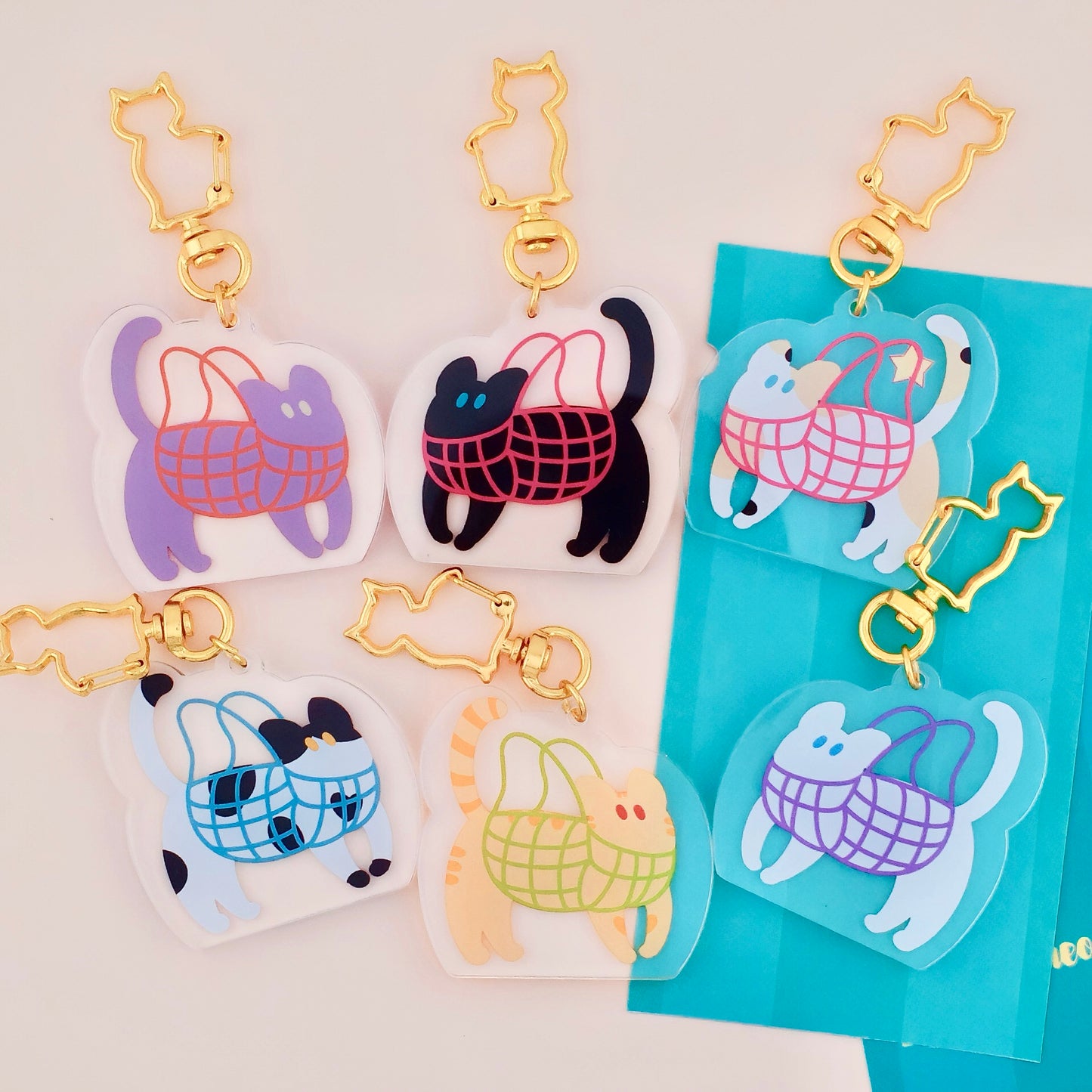 Kitties in Net Bags Acrylic Keychain