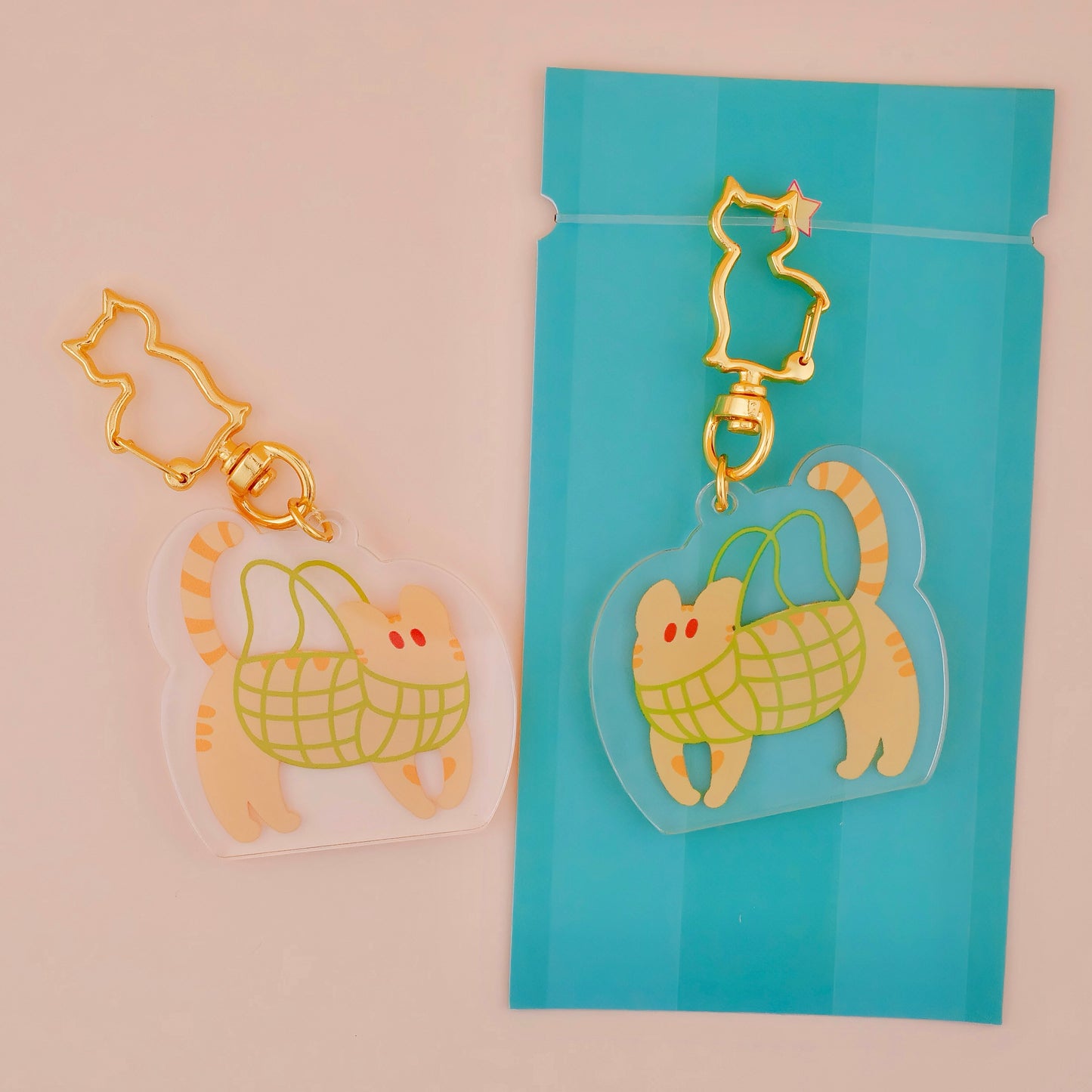 Kitties in Net Bags Acrylic Keychain